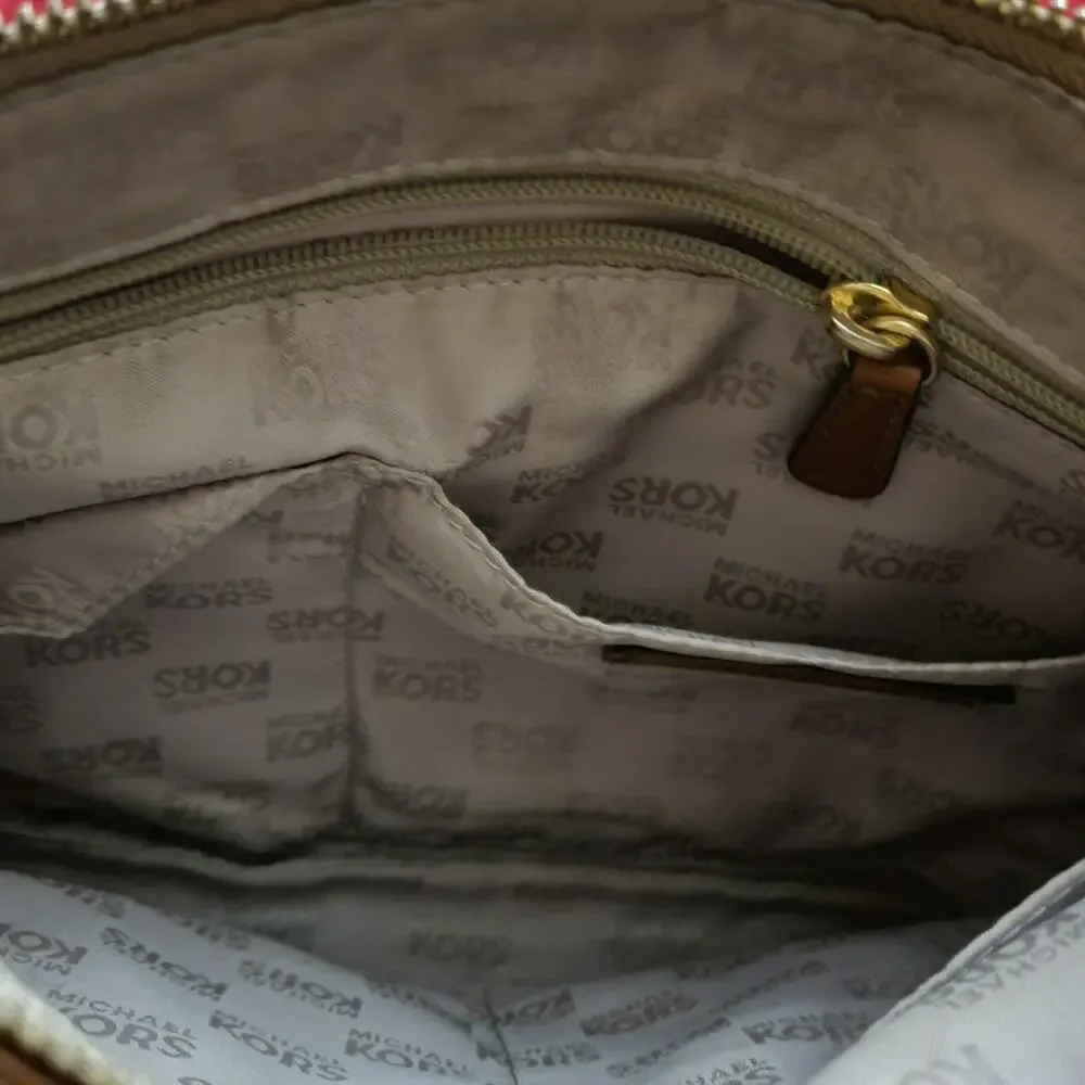 Michael Kors Jamesport Signature Handbag Tab with Leather and Gold Trim Striking